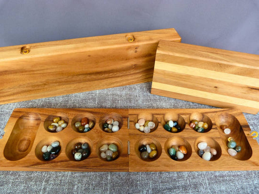 Hus bao und zwei Varianten von Kalaha aus Holz