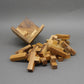125er Cube Knobelspiel aus Holz mit auseinandergebauten Rätsel-Elementen.