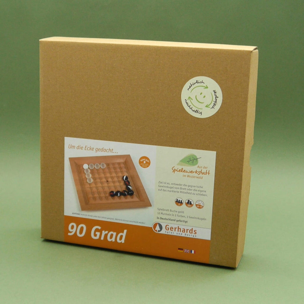 Kartonverpackung des Holzspiels „90 Grad“ von Gerhards mit Produktaufklebern auf grünem Hintergrund – Familienspiel.