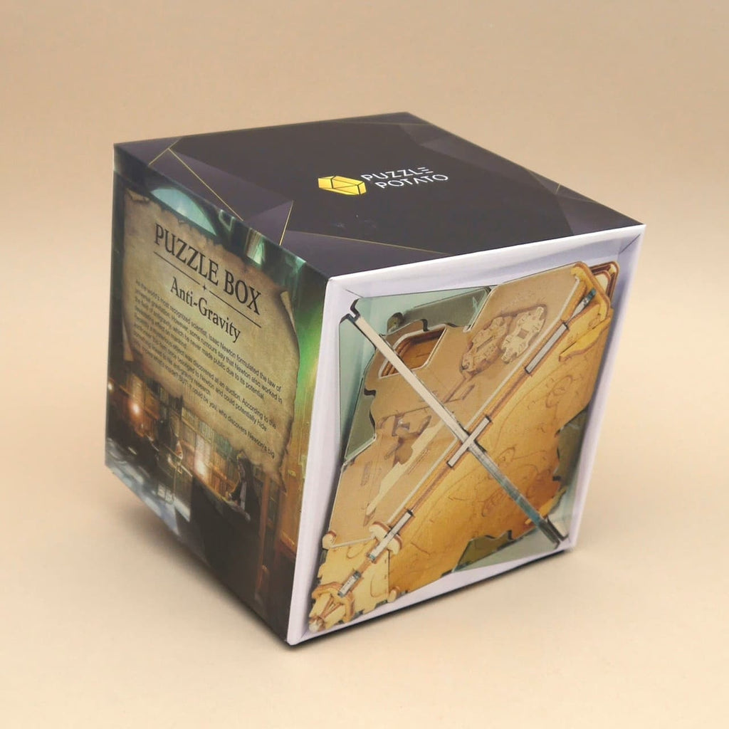 Cluebox Anti-Gravity in Verpackung: würfelförmige Box mit Vorschau des hölzernen 3D-Puzzles, Geschenkidee für Rätsel-Fans.