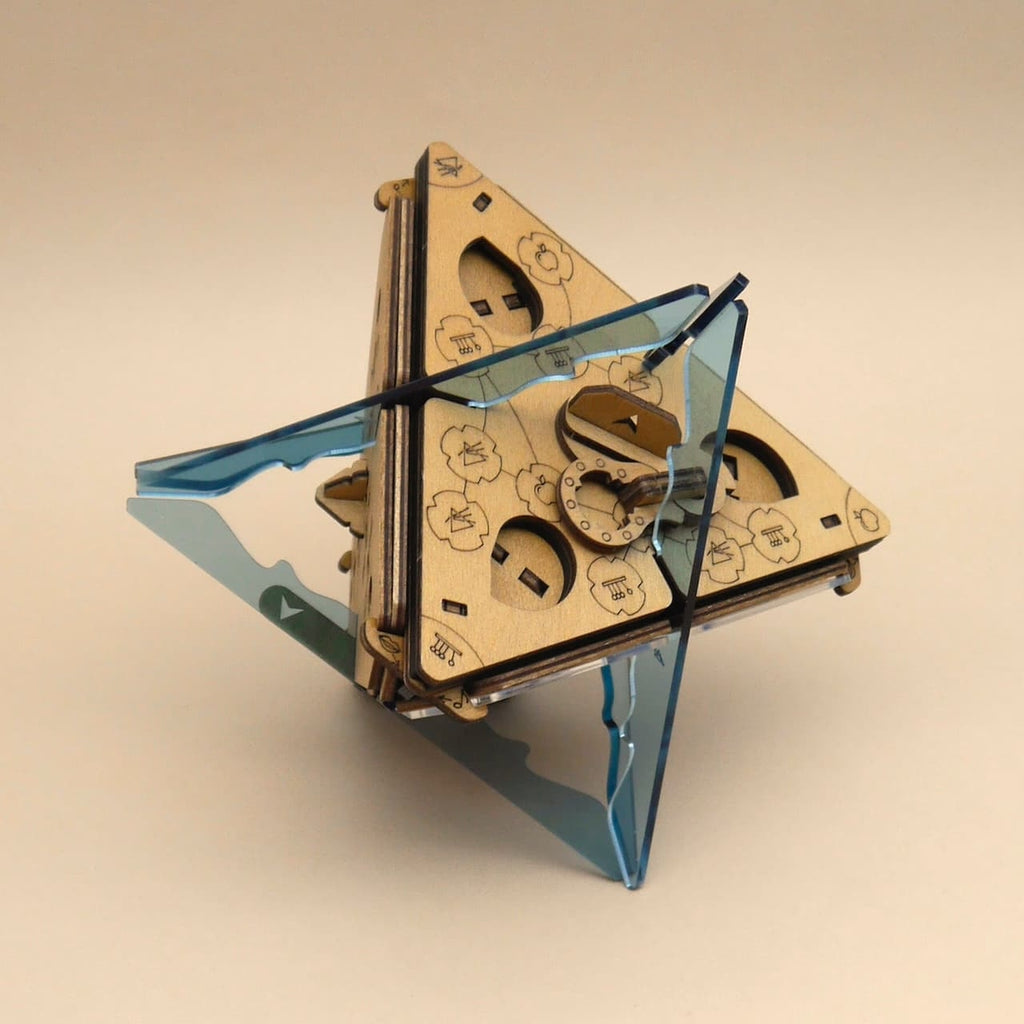 Logikpuzzle Anti-Gravity: dreidimensionales 3D-Puzzle aus Holz mit Zahnrädern und Symbolen, sammelbares Holzpuzzle für Tüftler.