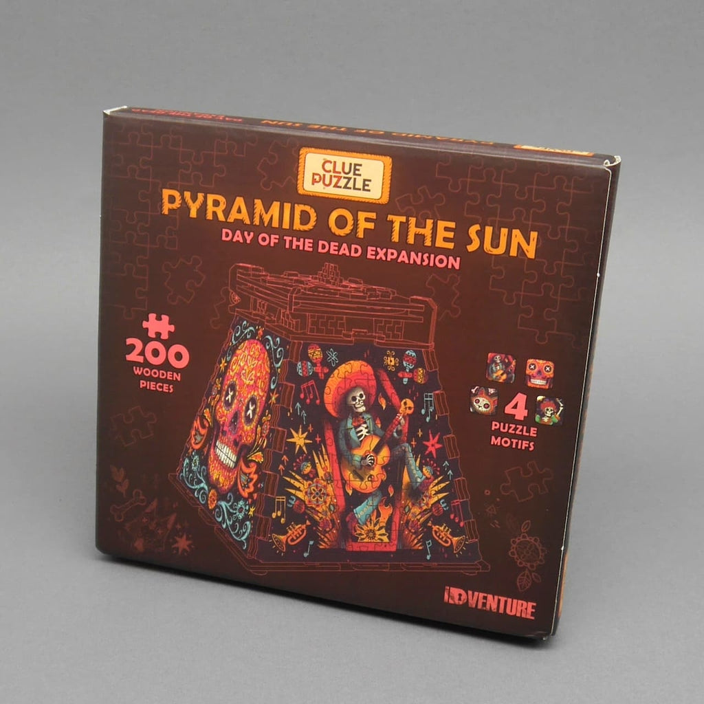 Produktbox ‚Pyramid of the Sun‘ mit Día-de-los-Muertos-Motiv – Puzzle in Form einer Schatztruhe für Geduldsspiel-Fans.