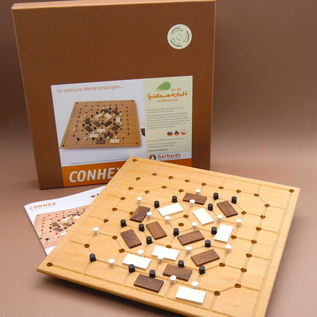 Conhex Holzspiel für 2 Spieler mit Spielbrett, Holzsteinen und Verpackung im Hintergrund – strategisches Verbindungsspiel aus Holz.