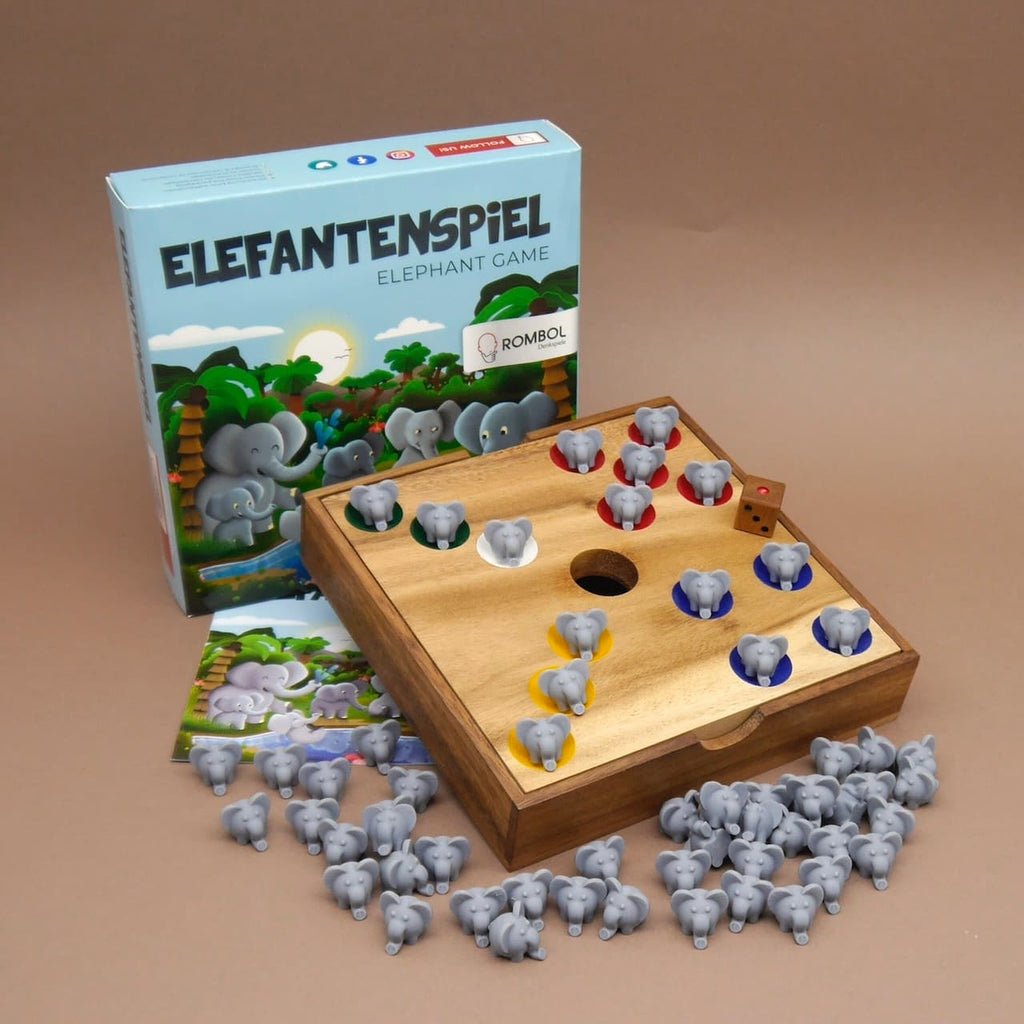 Holzbasiertes Holzspiel ‘Elefantenspiel’ mit Spielfeld, bunten Vertiefungen und zahlreichen grauen Elefantenfiguren vor der Spielschachtel.