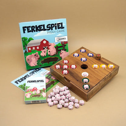 Komplettes Ferkelspiel mit Spielbrett, Schachtel, Anleitung und Schweinchen-Pöppeln – perfekt für ein spannendes Würfelspiel.