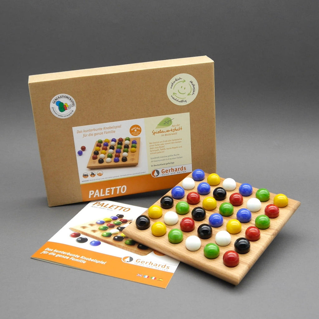 Paletto Taktikspiel: Set mit Verpackung, Anleitung und befülltem Murmelbrett.