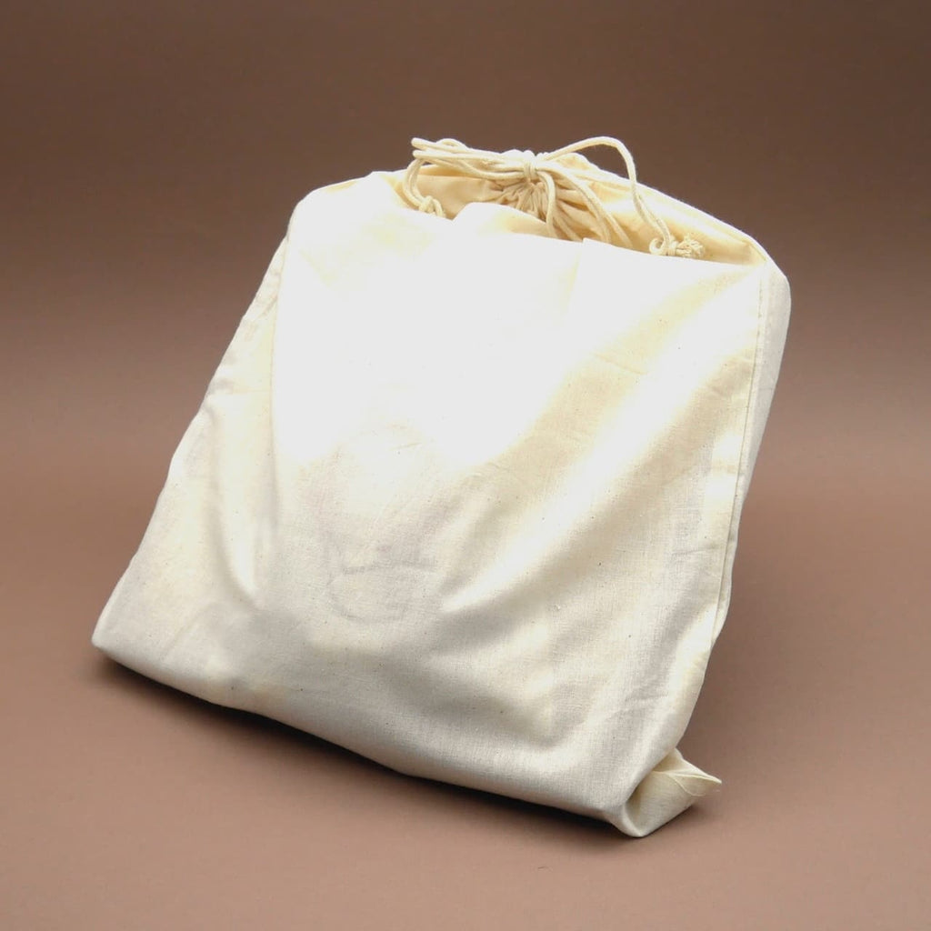 Leinenbeutel mit Kordelzug für das Quod Strategiespiel; robuste Aufbewahrung für Spielsteine und Brett, schlicht inszeniert.