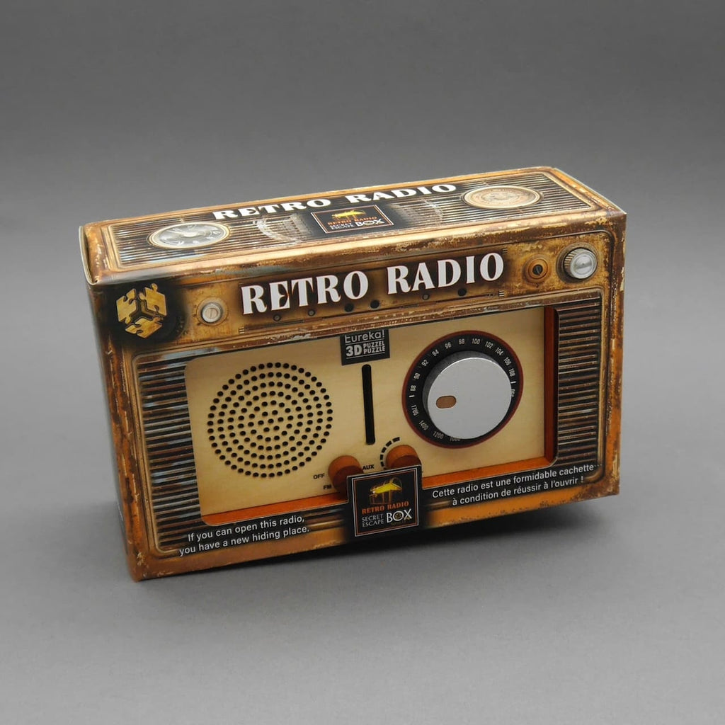 Box eines Retro-Radios im Vintage-Look; Präsentationsverpackung für ein Holzpuzzle mit Skala, Lautsprecher und Logos.