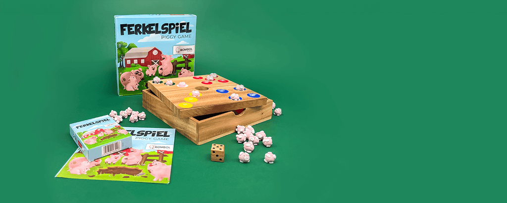Das Ferkelspiel aus Holz mit kleinen Schweinchen als Brettspiel für die ganze Familie