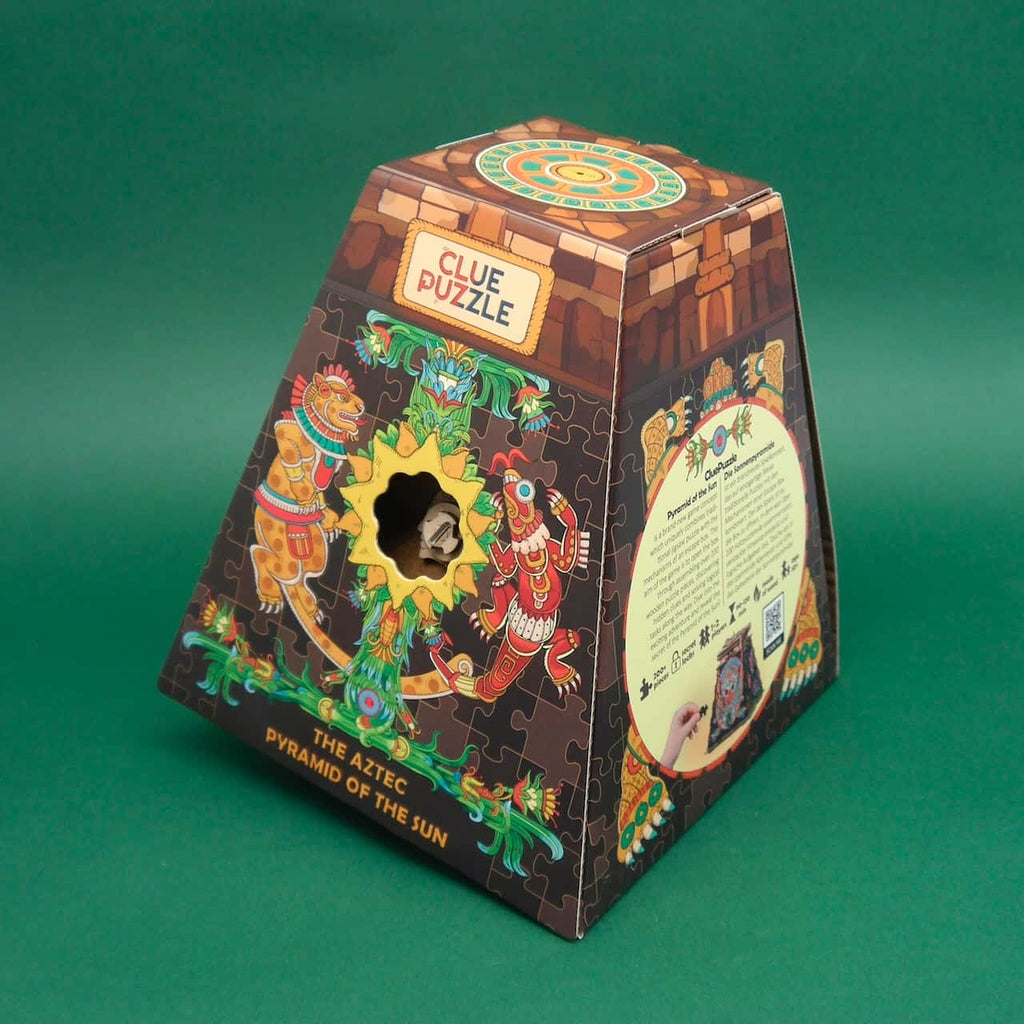 Verpackung ‚Pyramid of the Sun‘ Clue Puzzle: pyramidenförmige Box mit Sonnenöffnung und aztekischen Illustrationen.