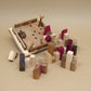 Holzspiel Stadtpuzzle als 3D Wooden Puzzle mit herausnehmbaren Holzbausteinen.