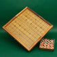 Xiangqi Taktikspiel mit leerem Holzbrett und Spielfiguren in separater Box – ideal für strategische Duelle.